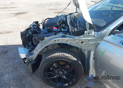 2025 Honda Civic Sport z USA, uszkodzony, nr VIN 2HGFE2F59SH549528